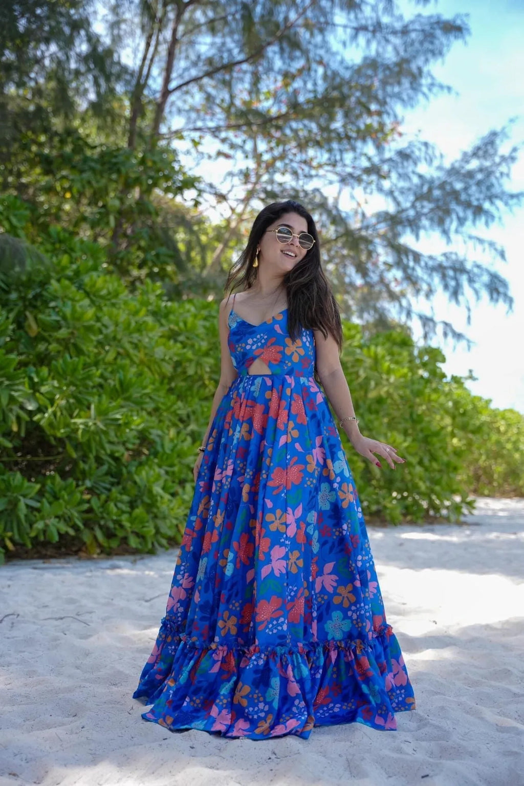 Vibrant Blue Floral Maxi Gown with Ruffle Hem