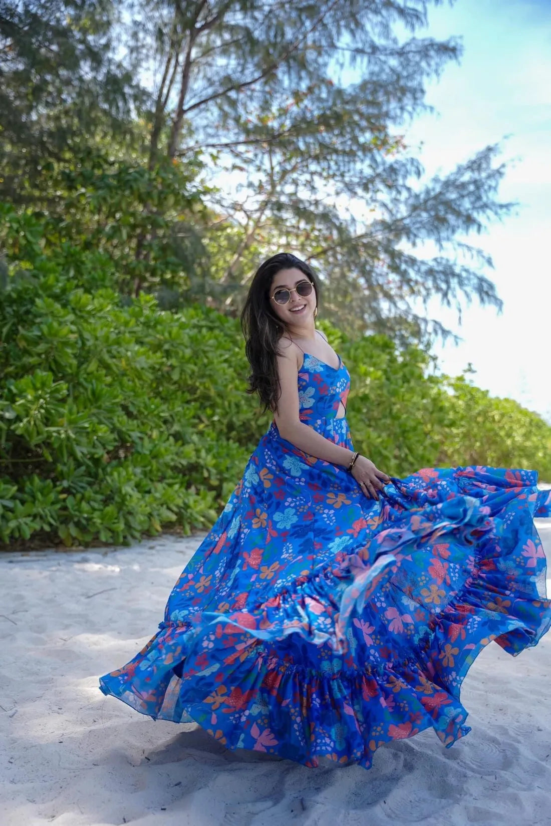 Vibrant Blue Floral Maxi Gown with Ruffle Hem