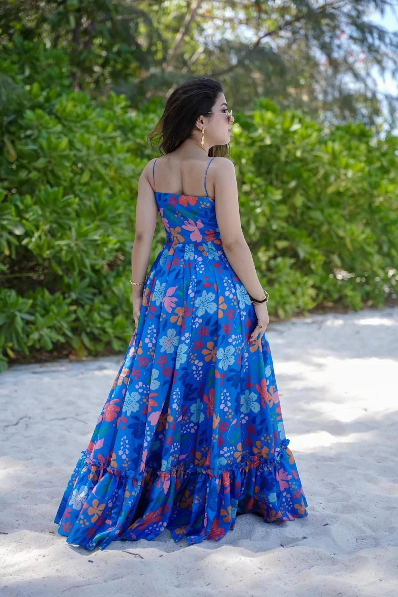 Vibrant Blue Floral Maxi Gown with Ruffle Hem